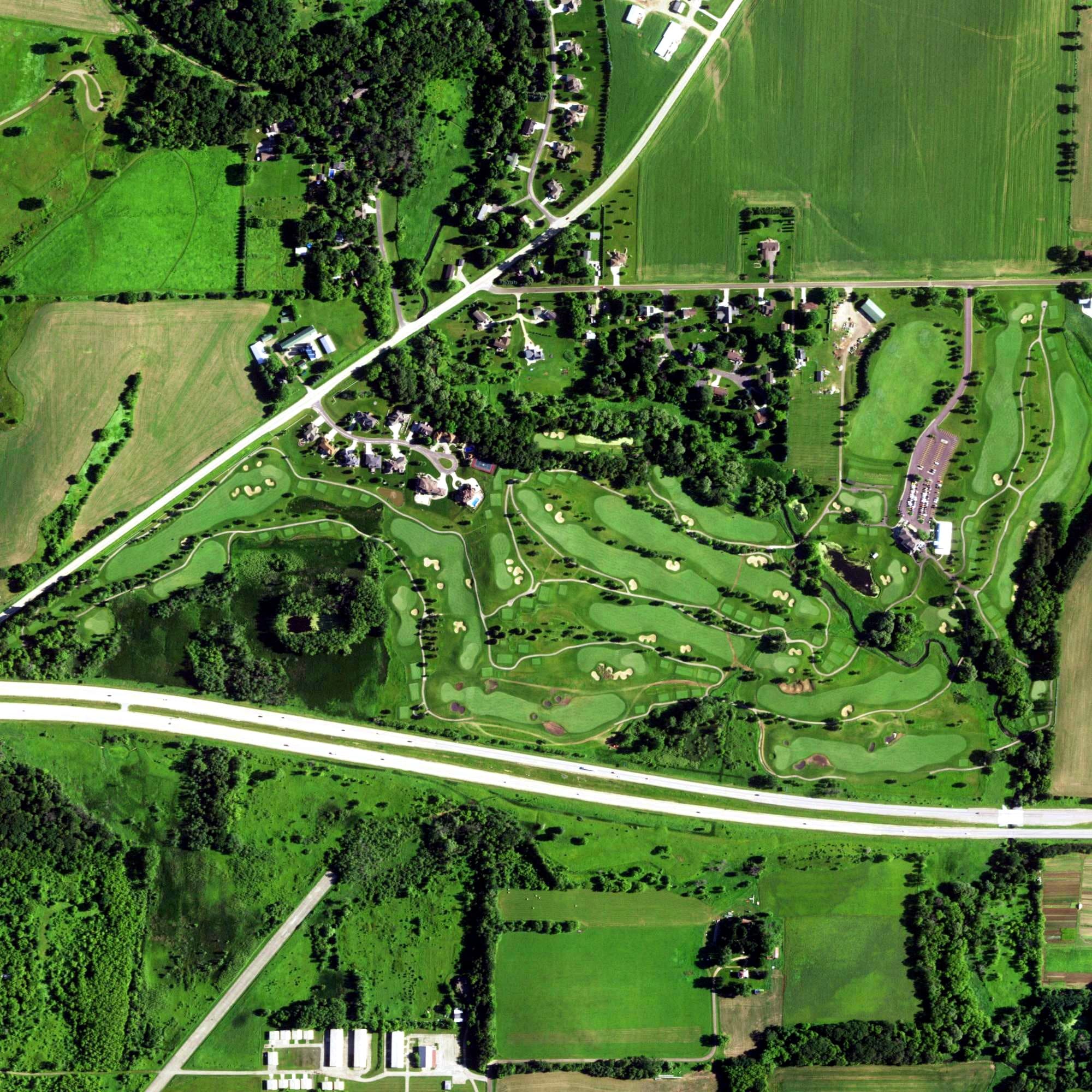 Aerial view of The Oaks Golf Course, WI, with its hole routing marked