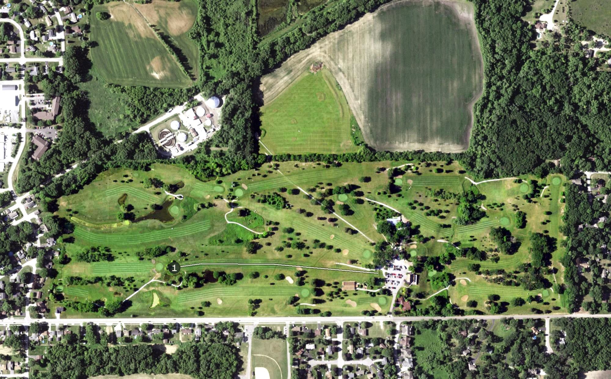Aerial view of Twin Lakes Country Club, WI, with its hole routing marked