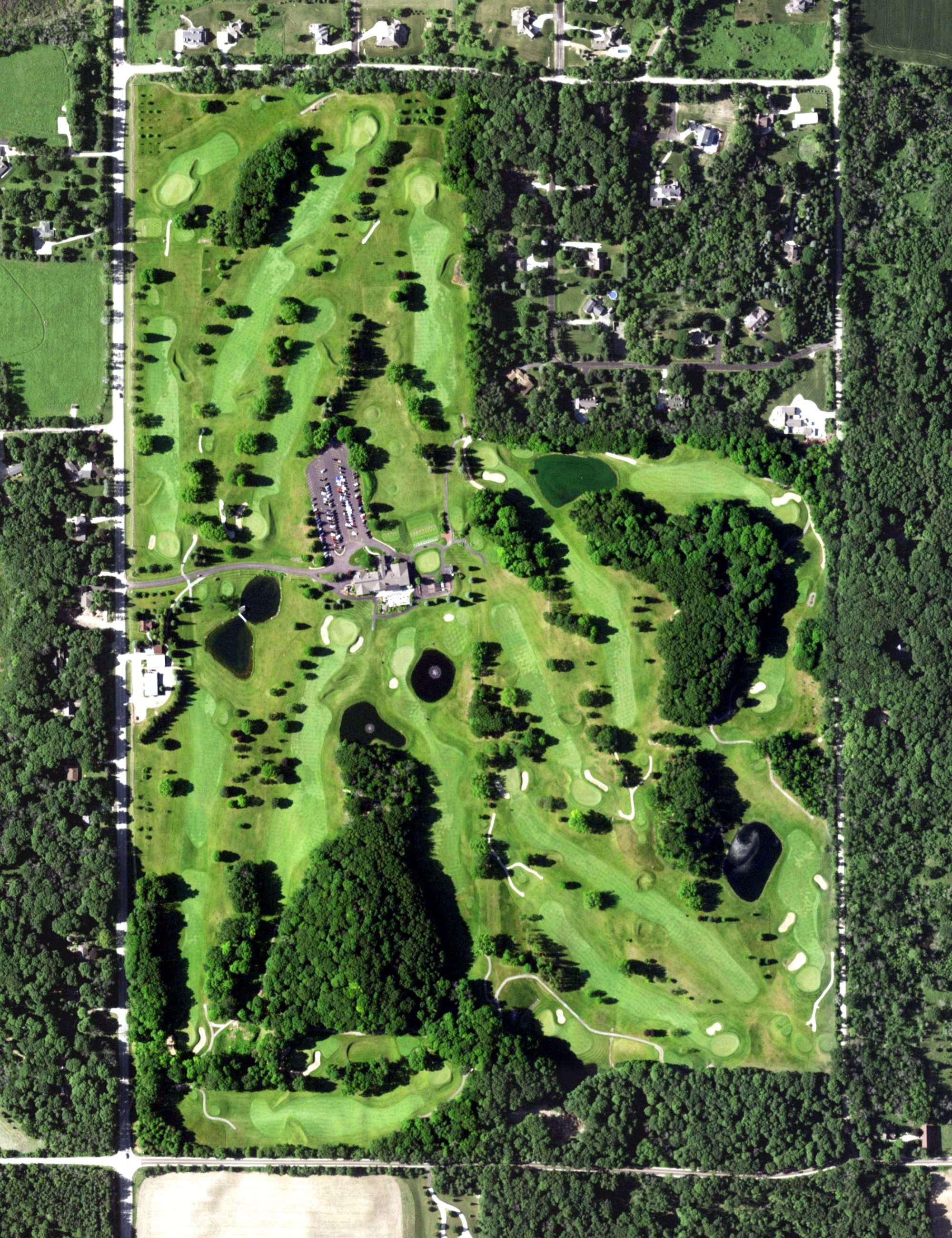 Aerial view of West Bend Country Club, WI, with its hole routing marked