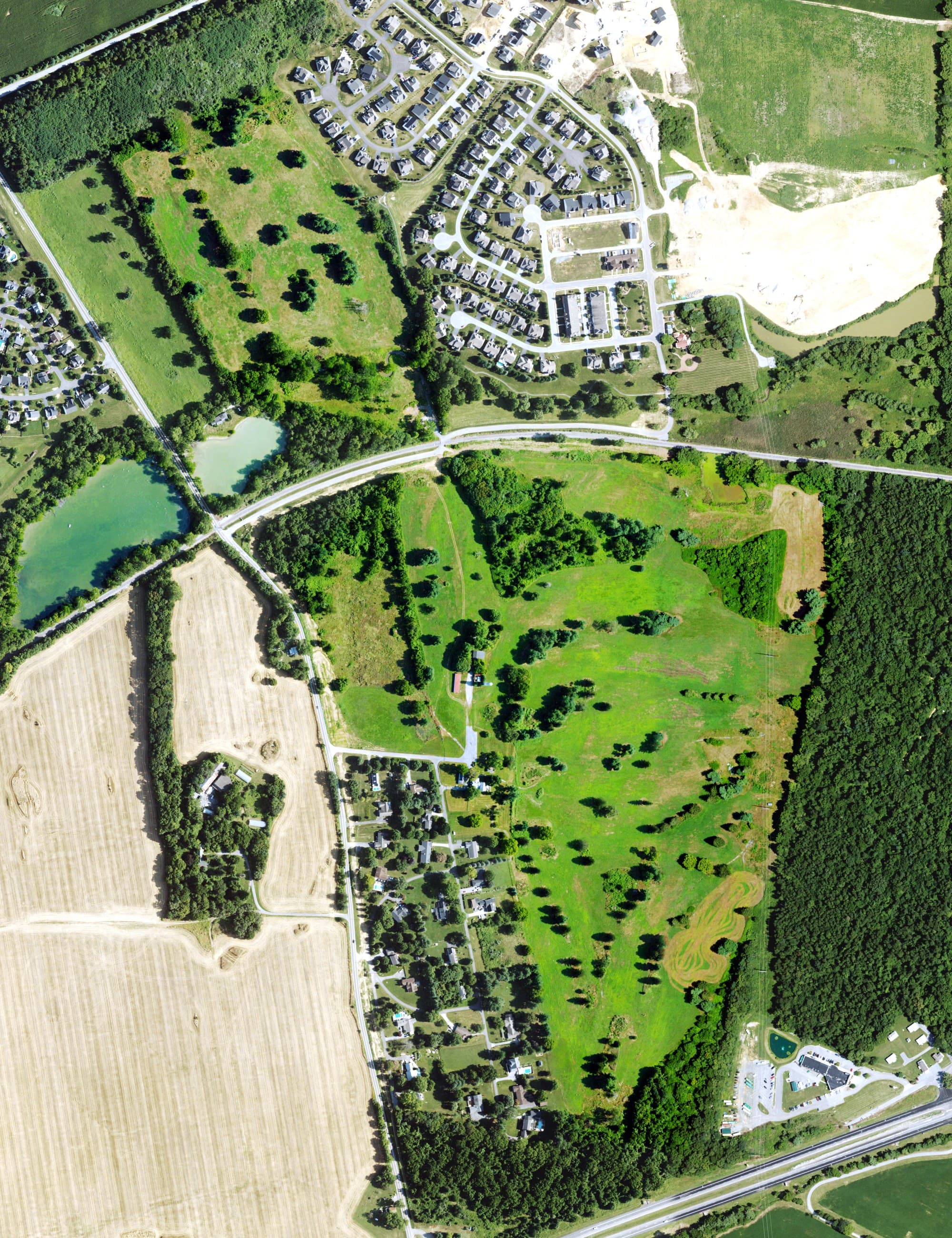Aerial view of Sleepy Hollow Golf and Country Club, WV, with its hole routing marked