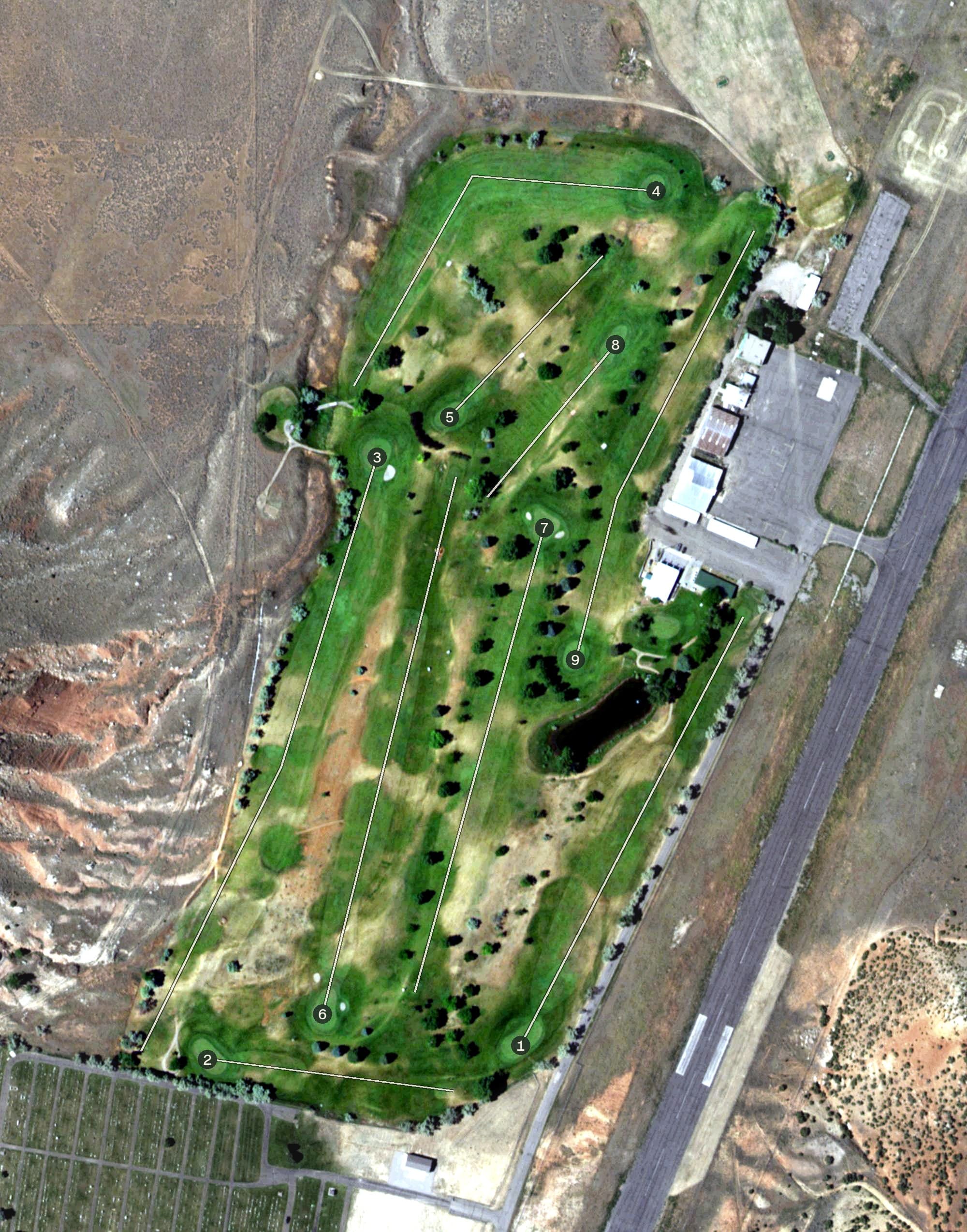 Aerial view of Thermopolis Golf Course, WY, with its hole routing marked